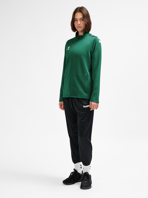 hmlCORE XK POLY ZIP SWEAT WOMAN, EVERGREEN, model