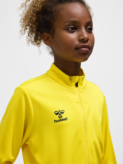 hmlESSENTIAL TRACK JACKET KIDS, BLAZING YELLOW, model