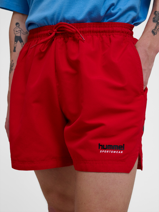 hmlNED SWIM SHORTS, BARBADOS CHERRY, model