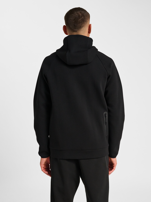 hmlTECH FLEECE REGULAR ZIP HOODIE, BLACK, model