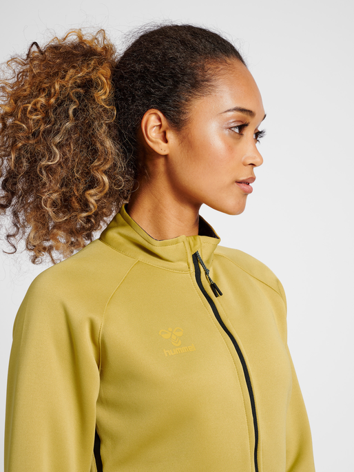 hmlCIMA XK ZIP JACKET WOMAN, ANTIQUE GOLD, model