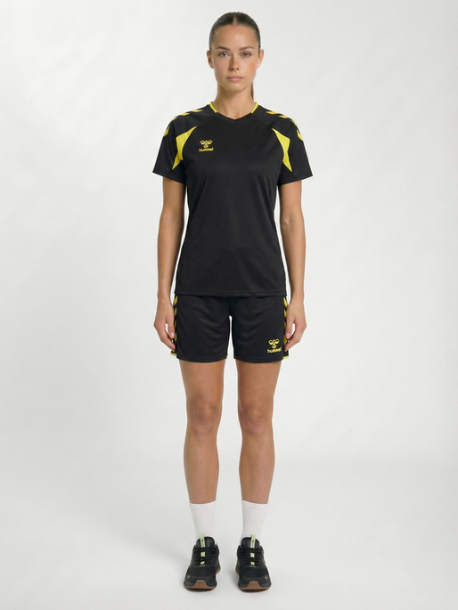 hmlCORE 2.0 SHORTS WOMAN, BLACK/BLAZING YELLOW, model