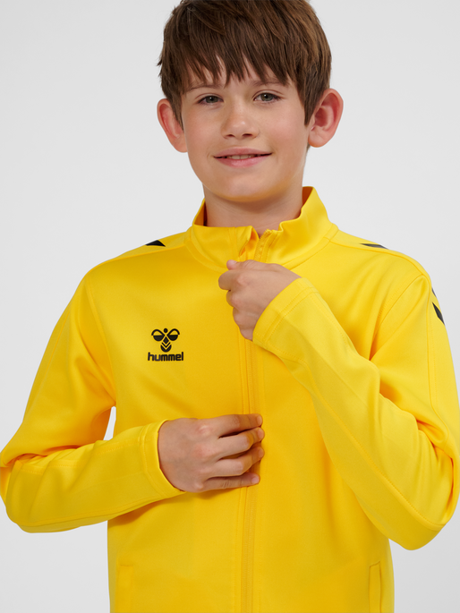 hmlCORE XK POLY ZIP SWEAT KIDS, SPORTS YELLOW, model
