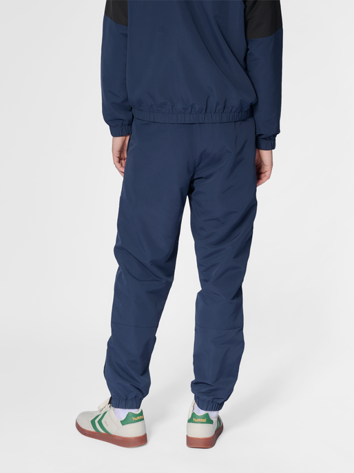 hmlTRACKSUIT PANTS SPORTSWEAR, DRESS BLUES, model