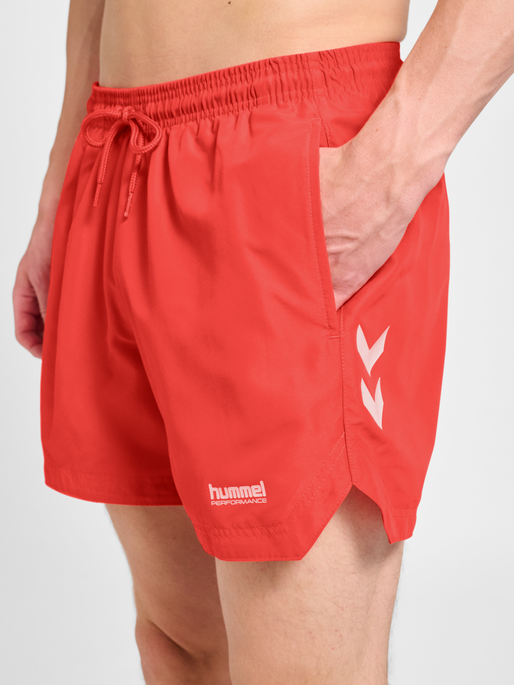 hmlPULSE SWIM SHORTS, CAYENNE, model