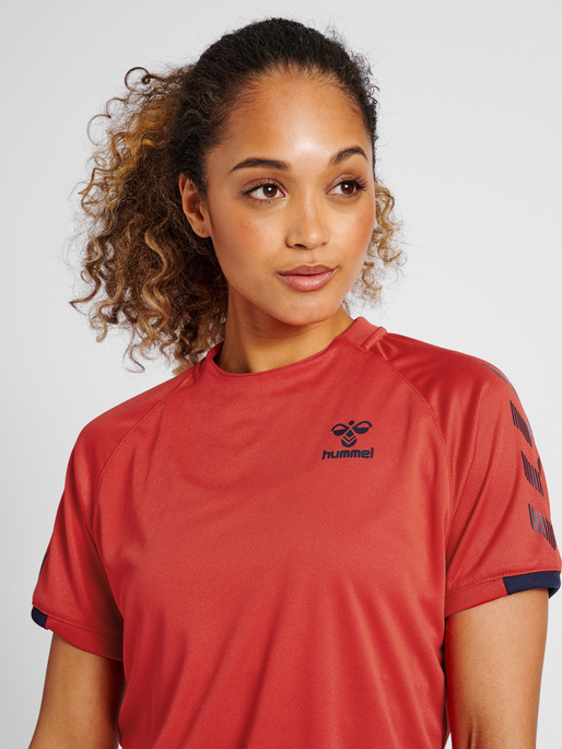 hmlGG12 ACTION JERSEY S/S WOMAN, AURA ORANGE, model