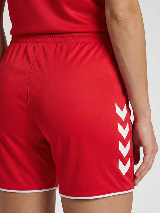 hmlCORE 2.0 SHORTS WOMAN, TRUE RED/WHITE, model