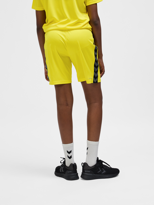 hmlAUTHENTIC PL SHORTS KIDS, BLAZING YELLOW, model