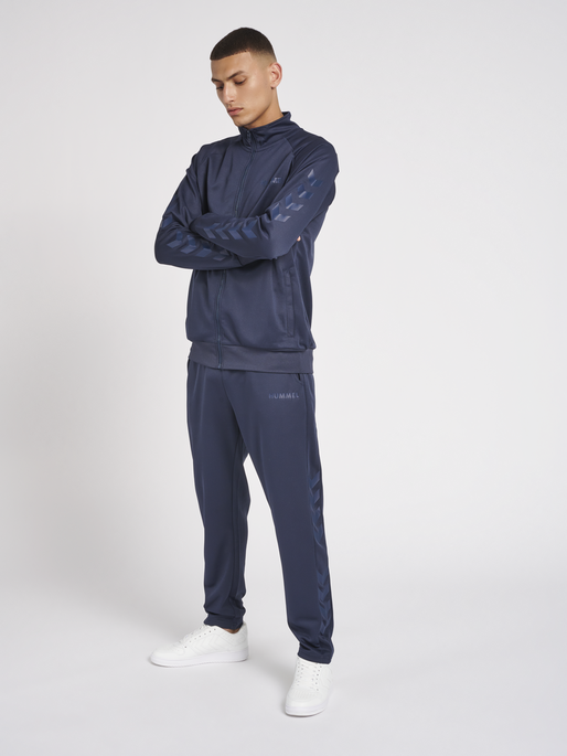 hmlLEGACY POLY ZIP JACKET, BLUE NIGHTS, model