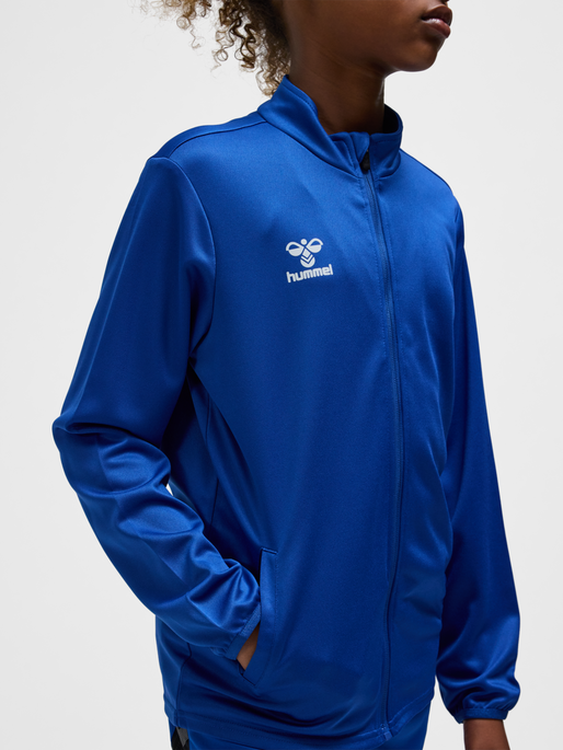 hmlESSENTIAL TRACK JACKET KIDS, TRUE BLUE, model