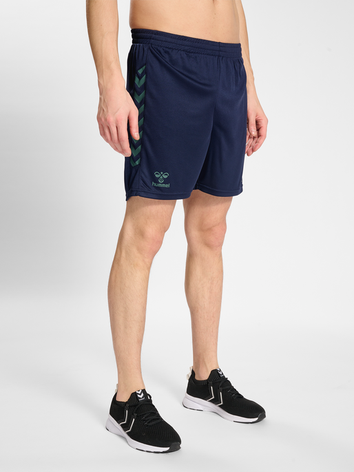 hmlSTALTIC POLY SHORTS, MARINE/DUCK GREEN, model