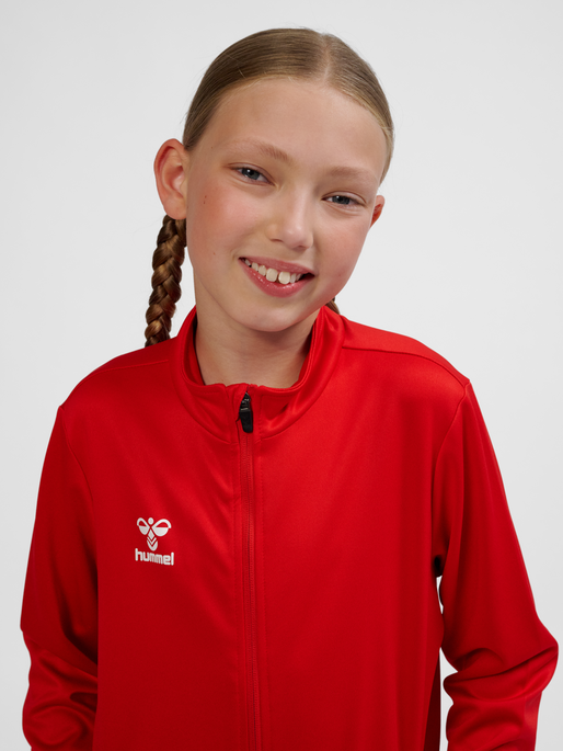 hmlESSENTIAL TRACK JACKET KIDS, TRUE RED, model
