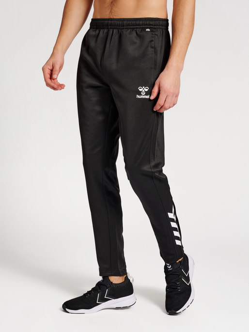 hmlCORE XK POLY PANTS, BLACK/BLACK, model