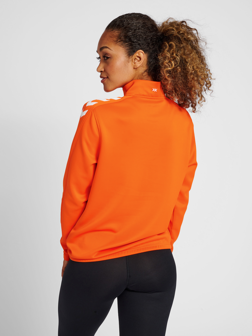 hmlCORE XK HALF ZIP SWEAT WOMAN, ORANGE TIGER, model