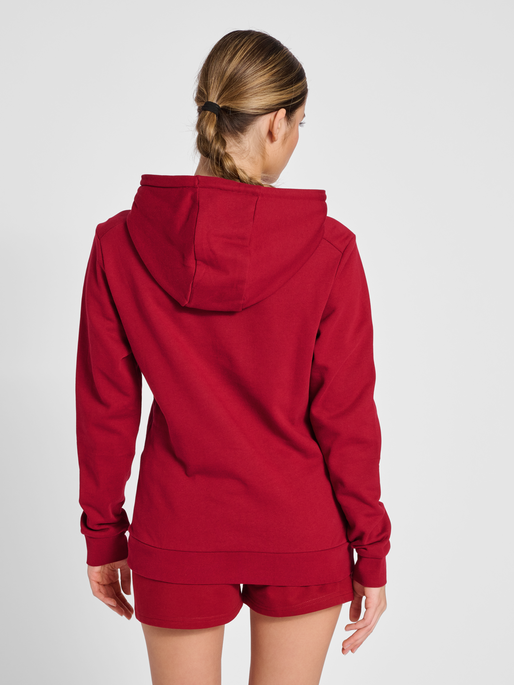 hmlOFFGRID HOODIE WO, RHUBARB/NASTURTIUM, model