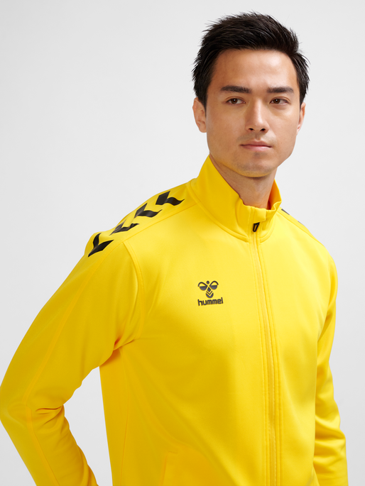 hmlCORE XK POLY ZIP SWEAT, SPORTS YELLOW, model
