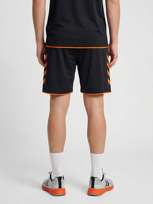 hmlCORE 2.0 SHORTS, BLACK/ORANGE TIGER, model